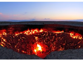 See awe-inspiring flaming gas crater in the sparse grandeur